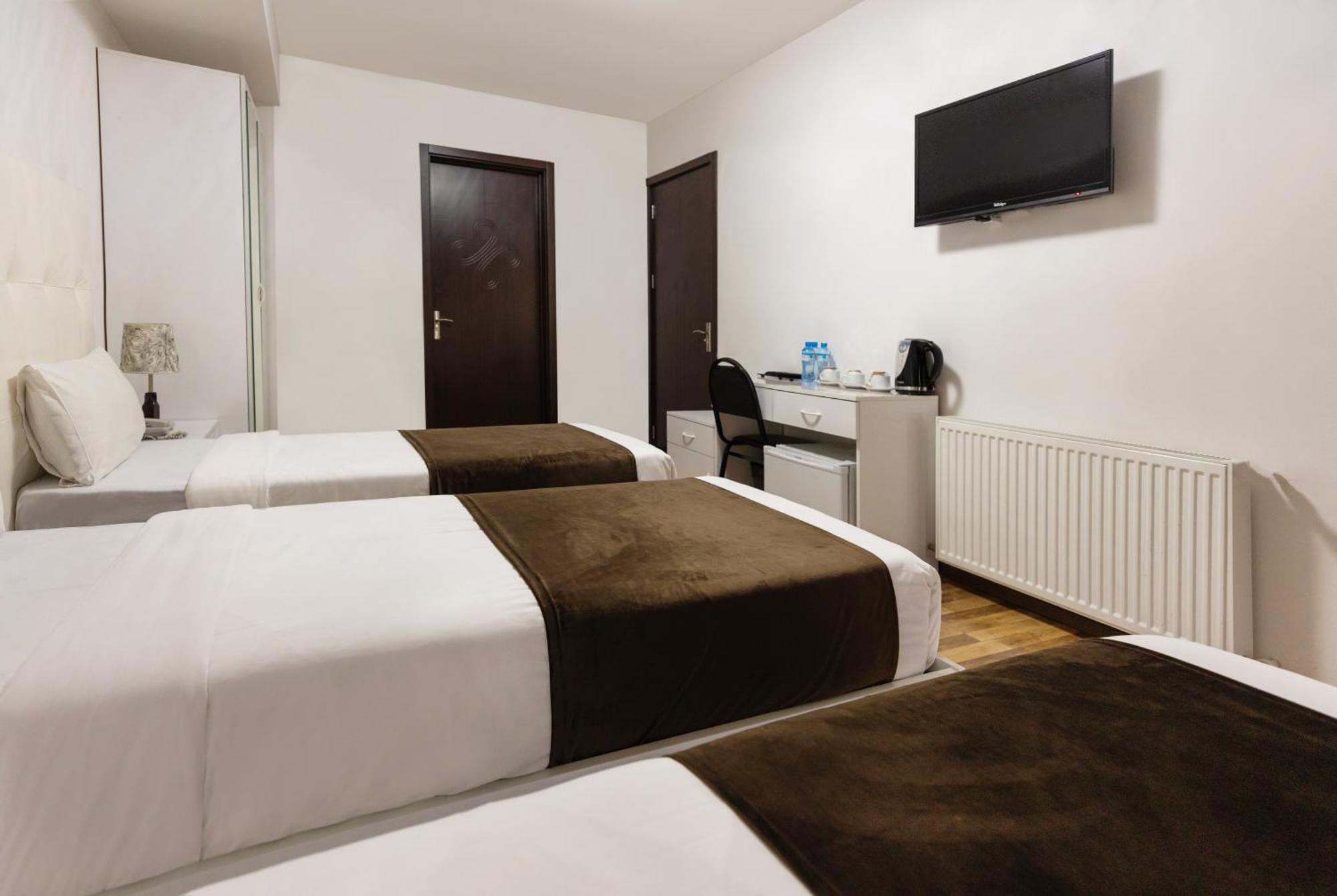 Hotel Grand Palace Tbilisi Quarto foto